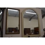 A decorative gilt framed wall mirror and a grey painted wall mirror (2)