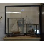 Two wooden model boats in glazed display cases, 'Bragozzo Venetian Fishing Boat' and 'Commended