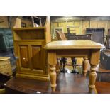 A small panelled pine wall hanging cabinet to/w a square pine occasional table (2)