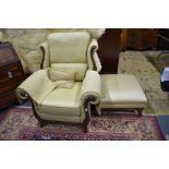 Wade Upholstery wing armchair with matching footstool (2)