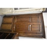 A Victorian pine floor standing corner cupboard with panelled doors