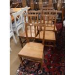 A set of seven 1930s oak chairs with panelled seats, comprising six side chairs and one carver (7)