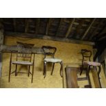 A pair of Victorian carved mahogany side chairs (non matching upholstery) to/w an Edwardian inlaid