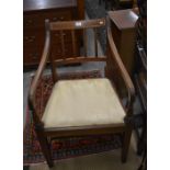 A 19th mahogany framed carver chair with gold and cream damask pad seat