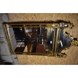 A Regency style decorative gilt wall mirror