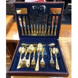 A cased 'Westbury' canteen of Viners gold plated cutlery