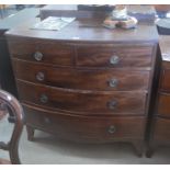 A Victorian mahogany and ebony banded bowfront chest of two short over three long drawers raised
