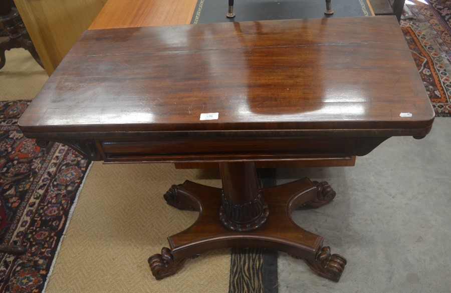 A Regency mahogany card table with folding baize-lined top raised on a turned and carved column - Image 2 of 2