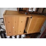 A pair of Habitat light oak chests each with three drawers having recessed circular handles raised