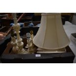 Four various sized cream painted wood table lamps with cream shades
