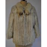 White/tipped grey fox fur jacket