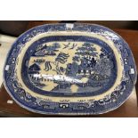 A large 19th century Davenport blue and white transfer printed Willow pattern turkey/meat plate