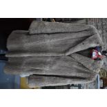 A lady's pale taupe musquash fur coat