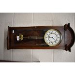 A 'Comitti' London Vienna regulator triple-train wall clock