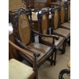 A set of six carved oak 17th century style dining chairs with caned backs, brown leather pad seats