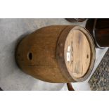 A vintage coopered oak barrel