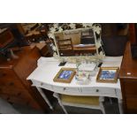 A French painted serpentine front dressing table with tree drawers to/w a painted stool and