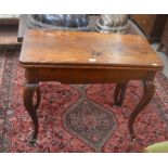 A 19th century mahogany card table with folding baise-lined top raised on cabriole supports with