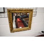 A square 18th/19th century English giltwood mirror