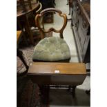 An Edwardian mahogany Sutherland table to/w a pair of carved mahogany side chairs (3)