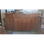 A William Tillman Georgian style inlaid mahogany breakfront sideboard with three drawers over