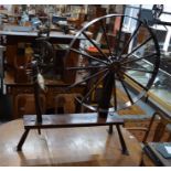 A good stained pine replica of a walking spinning wheel, 145 cm h