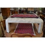A square glass top coffee table, the wooden frame with block stone veneers a/f