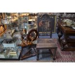 An antique pine and fruitwood spinning wheel to/with a Portugese/Spanish side chair