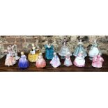 Nine Royal Doulton figurines:  Rhapsody;  Symphony; Marie; Rose; Tootles; Dinky De; Cookie; Bo-