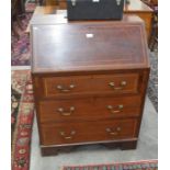 A mahogany inlaid fall front bureau with fitted interior and three long drawers, raised on shaped