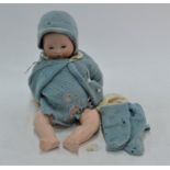An Armand Marseille 351./3 1/2k bisque-headed baby doll