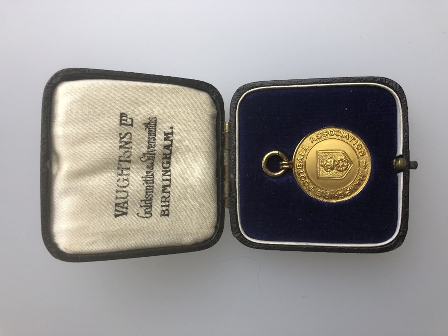 A 9ct yellow gold Hampshire FA medal