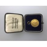 A 9ct yellow gold Hampshire FA medal