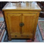 An antique oriental elm cabinet