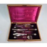 A Victorian steel seven piece carving/serving set