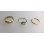 A 22ct yellow gold narrow wedding band and other rings