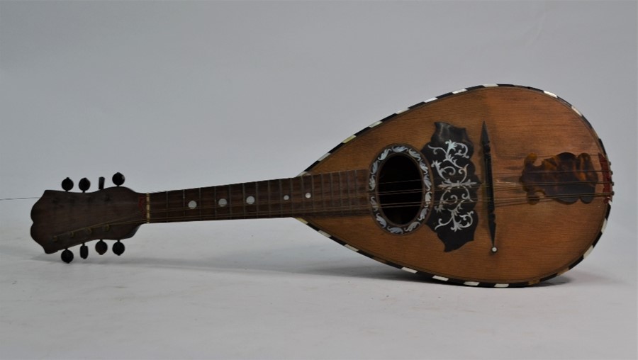 An antique Italian rosewood-veneered mandolin