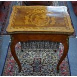 A fine quality ormolu mounted marquetry yew -wood work table, 19th century, in the manner of the cab