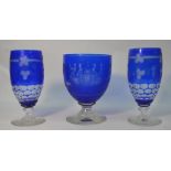 Three 19th century blue flash glass goblets