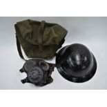 A WW2 civilian-type helmet etc.