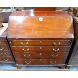 A Georgian checker line inlaid mahogany bureau