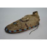 An antique Native American child's mocassin