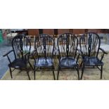 Four ebonised beech Windsor armchairs with bentwood bow-back with wheel splats (4)