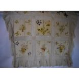 An embroidered ivory silk and 19th century lace coverlet etc.