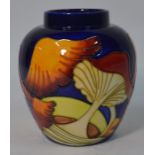 A modern Moorcroft Pottery vase decorated with mushrooms