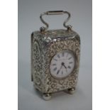 A Victorian silver boudoir clock