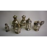 An Edwardian silver three-piece condiment set