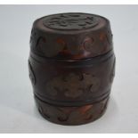 A Chinese hardwood barrel form caddy