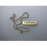 A 9ct yellow gold belcher chain with 9ct yellow gold ingot