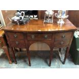 A George III mahogany bowfront sideboard